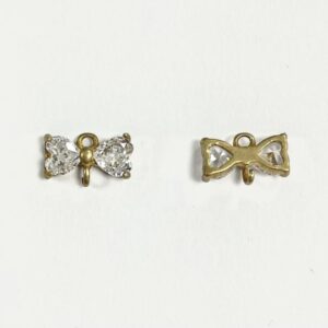 FIOCCHETTO ZIRCONI E DOPPIO ANELLINO MM.10